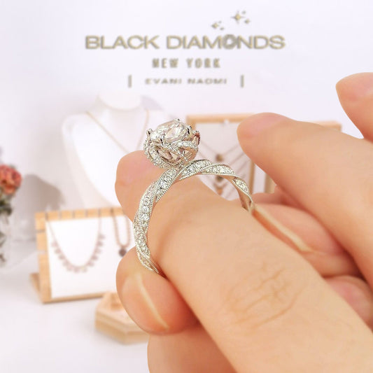 Round Cut 18k Moissanite Halo Twist Engagement Ring-Black Diamonds New York