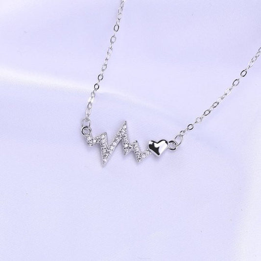 Round Cut Created Sapphire Heartbeat Pendant Necklace - Black Diamonds New York