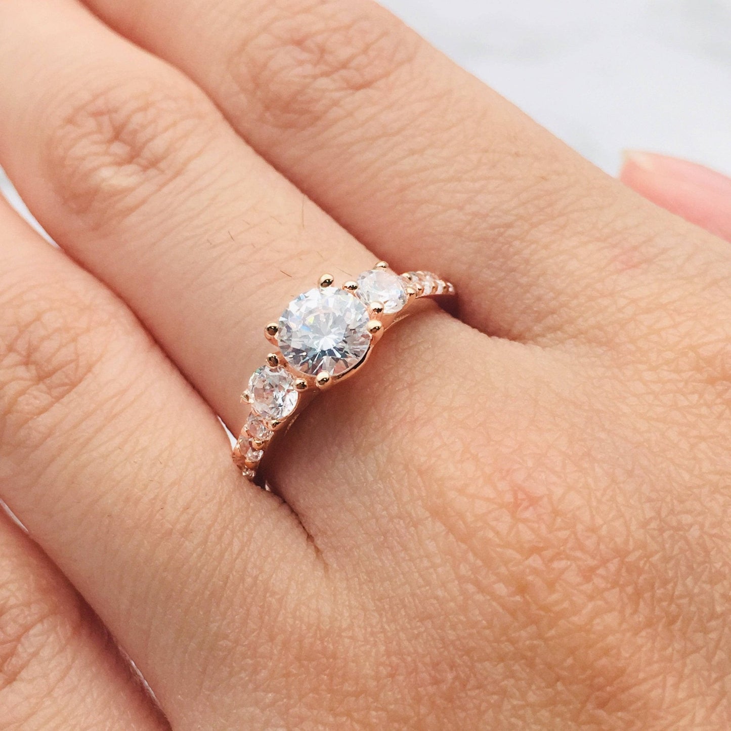 Round Cut Moissanite 4 Prong Rose Gold Engagement Ring - Black Diamonds New York