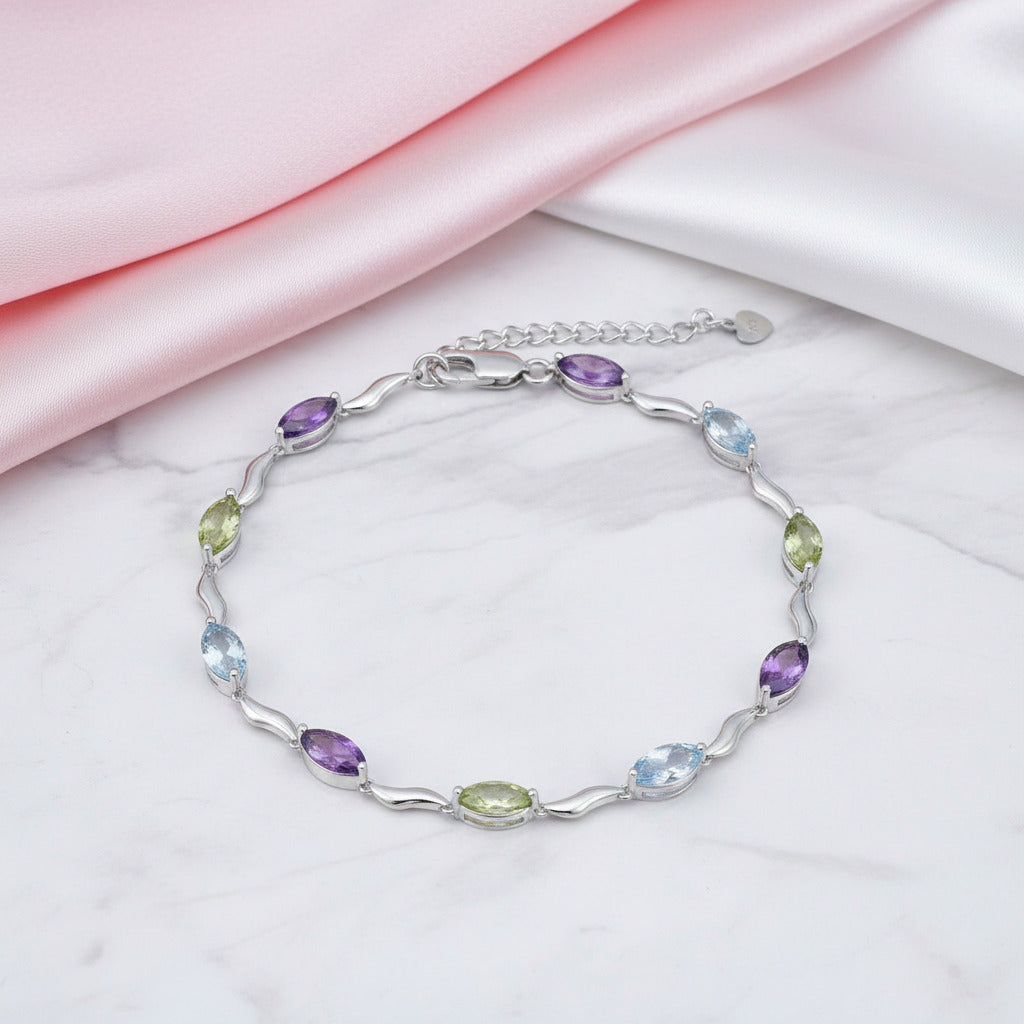 Marquise Cut Sky Blue Topaz, Peridot & Amethyst Bracelet-Black Diamonds New York