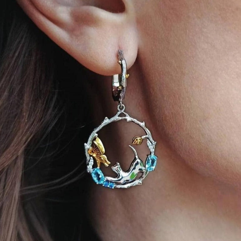 Swiss Blue Topaz Cat and Cupid Drop Earrings-Black Diamonds New York