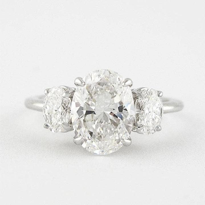 White Gold White Sapphire Oval Cut Three Stone Engagement Ring-Black Diamonds New York