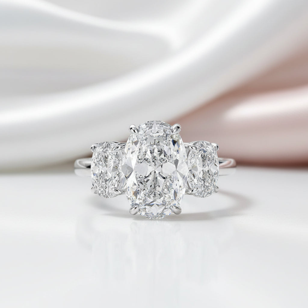 White Gold White Sapphire Oval Cut Three Stone Engagement Ring-Black Diamonds New York
