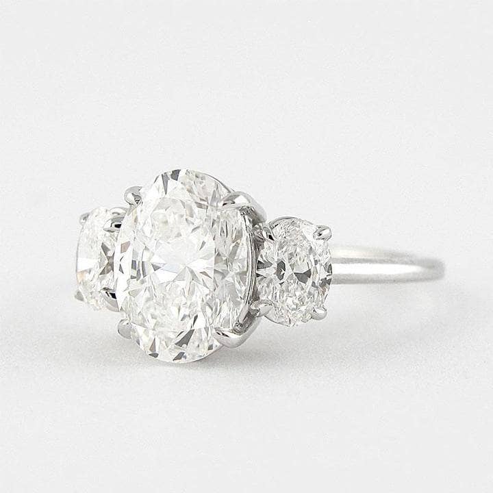 White Gold White Sapphire Oval Cut Three Stone Engagement Ring-Black Diamonds New York